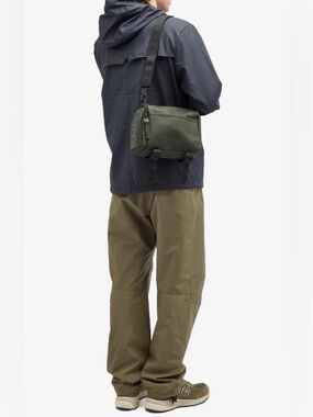 RAINS Unisex Texel Crossbody Bag PU Waterproof in Dark Green | Travel Minimalist